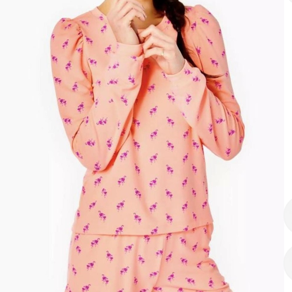 NEW Elevate your wardrobe with this stunning Lilly
Pulitzer Flamingo